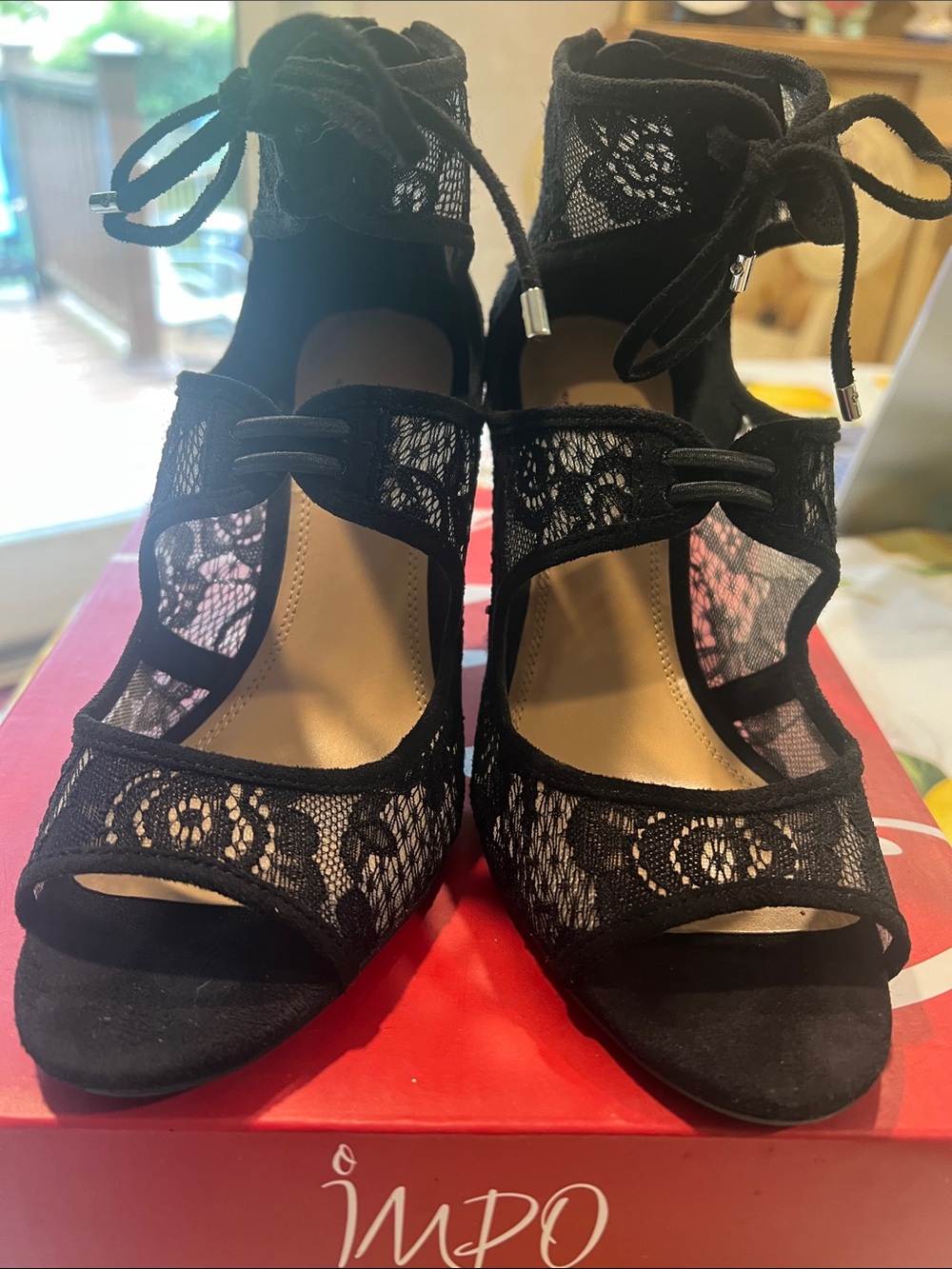 New, boxed Black Lace Peep-Toe Heels with Ankle Tie size 8M. Heel 3 1/4”